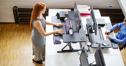 The Health and Productivity Benefits of Standing Desk at Work - Purpleark